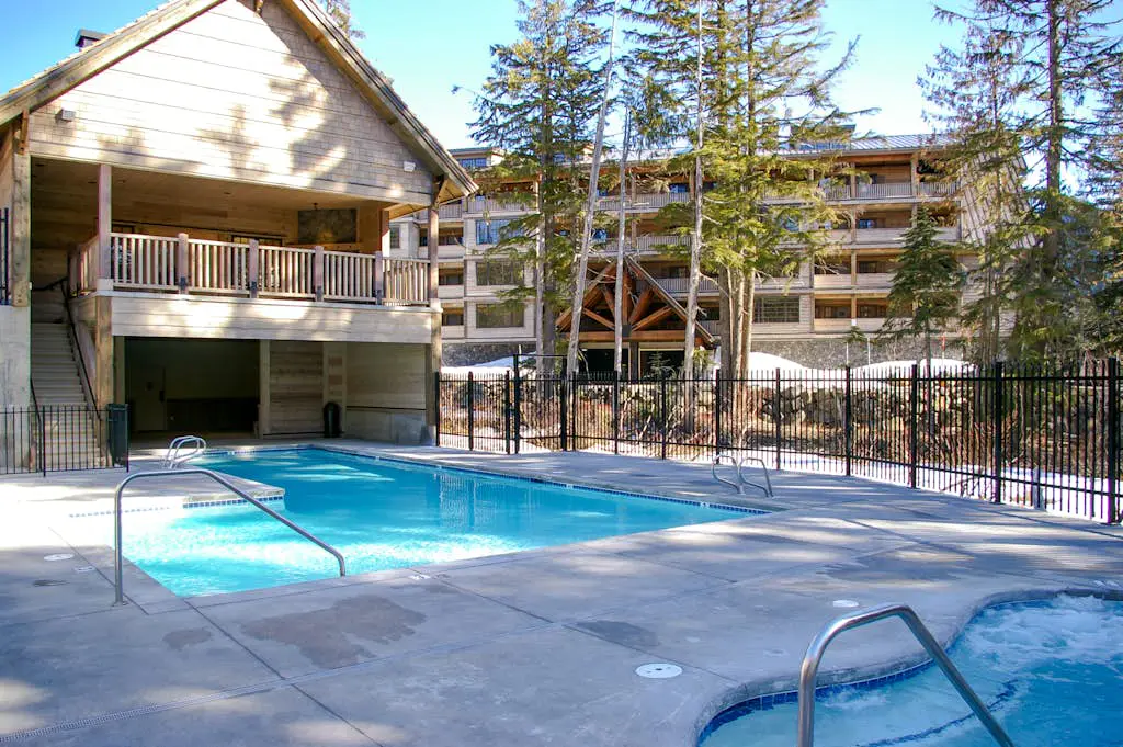 Luxury mountain home withshared pool & hot tub, patio, balcony views, & free WiFi