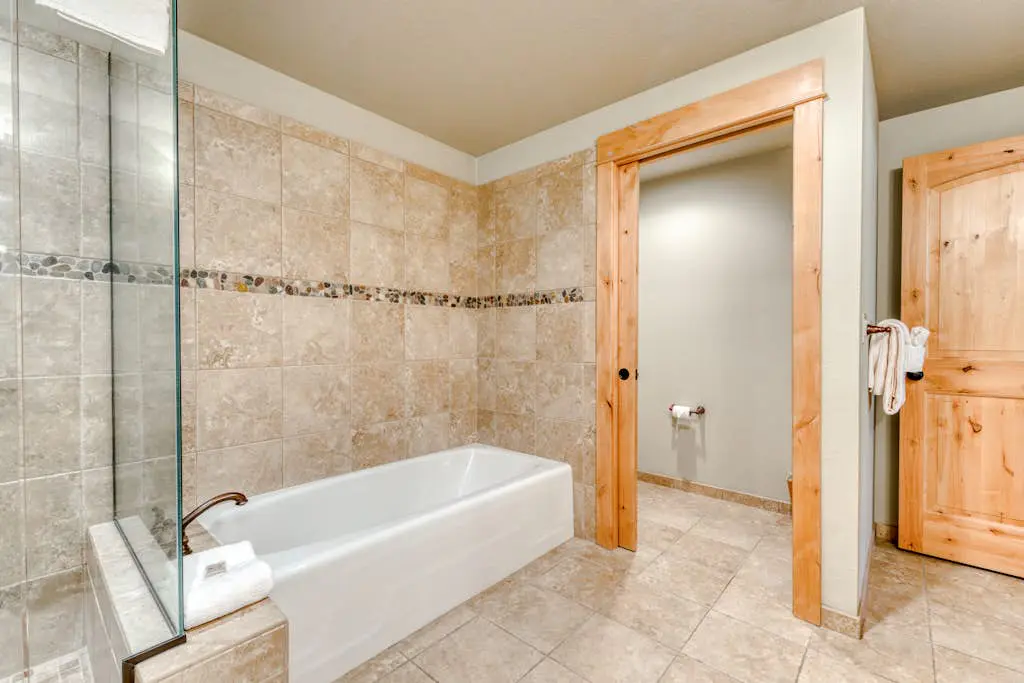 Luxury mountain home withshared pool & hot tub, patio, balcony views, & free WiFi