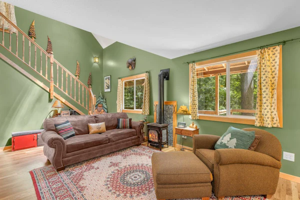 Recently remodeled riverfront home with fireplace, firepit & W/D - dog-friendly