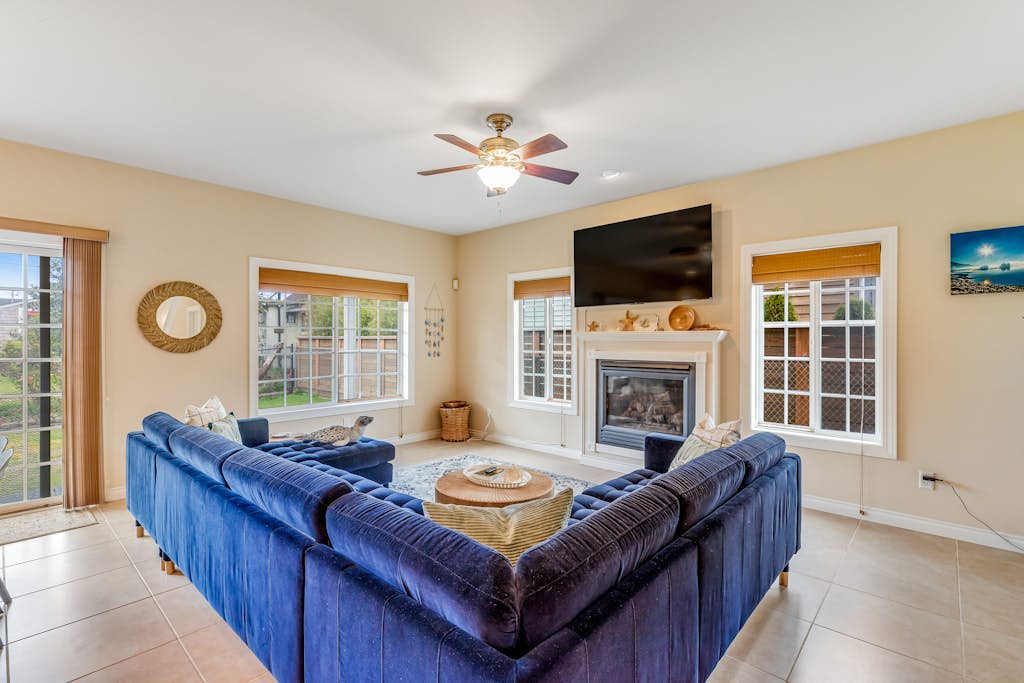 Charming coastal home close to the beach with a fireplace, yard, & W/D