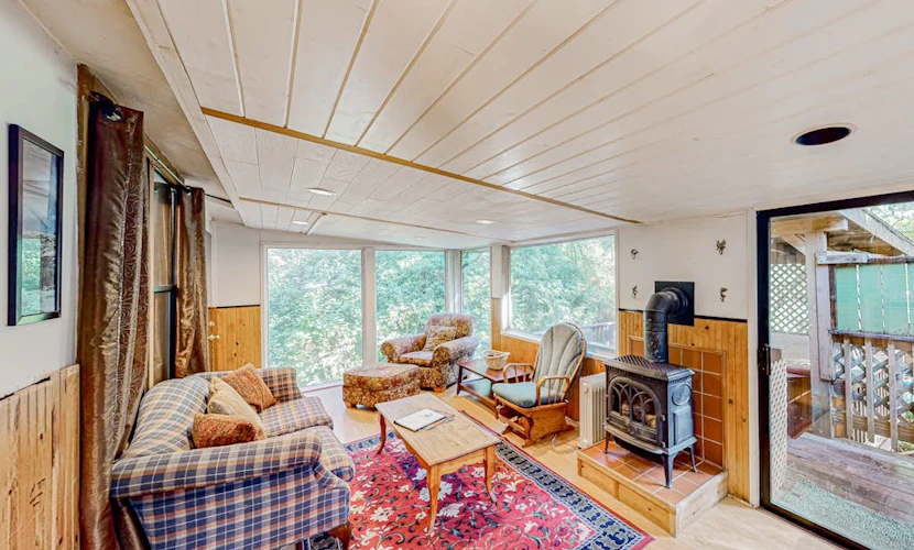 Delightful coastal escape with private hot tub, generous patio, & nature views
