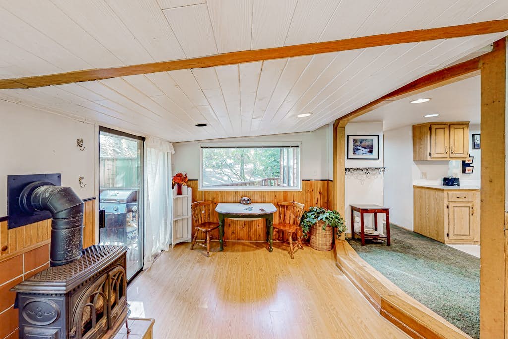 Delightful coastal escape with private hot tub, generous patio, & nature views