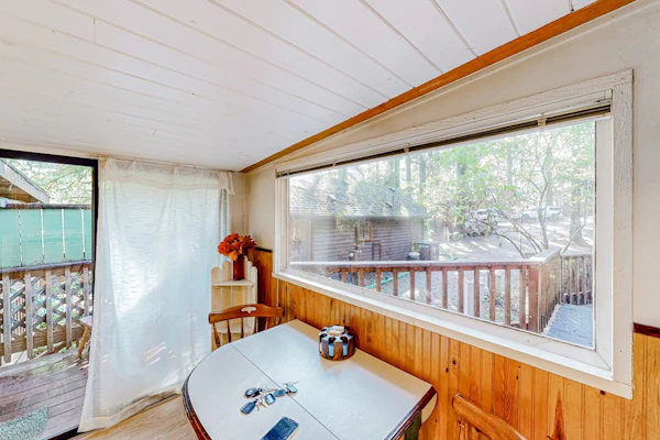 Delightful coastal escape with private hot tub, generous patio, & nature views