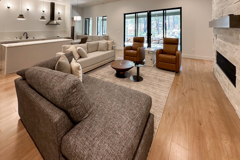 Spacious new construction home with forest views and resort amenities