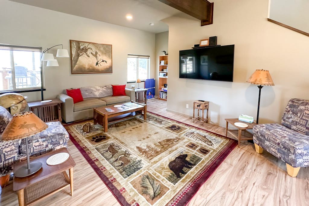 Coastal acreage with wrap-around deck & furnished patio - great location