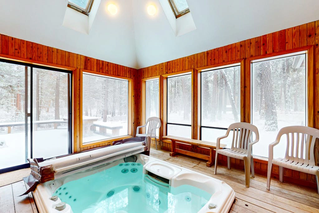 Beautiful and spacious family-friendly home with indoor hot tub, fireplace, patio