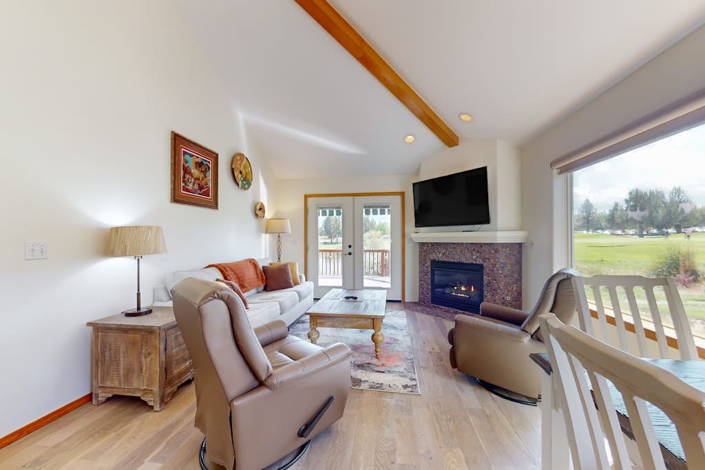 Charming waterfront townhouse with fireplace, pool, hot tub, & washerdryer