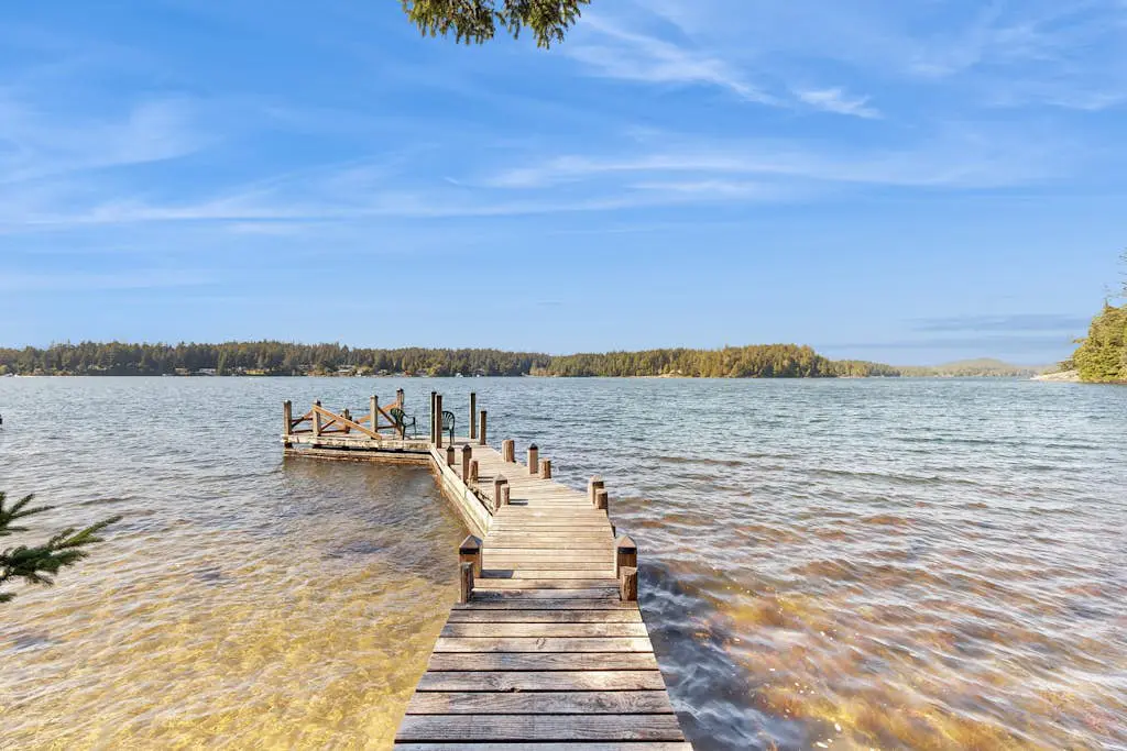Unique lakefront cabin near the dunes with a private dock & fireplace