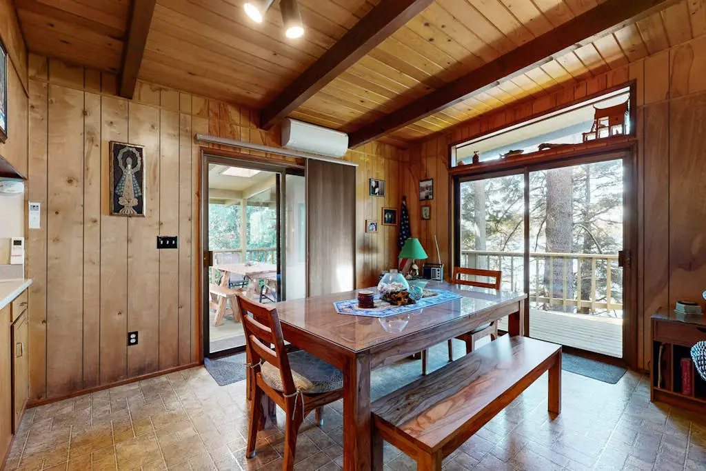 Unique lakefront cabin near the dunes with a private dock & fireplace