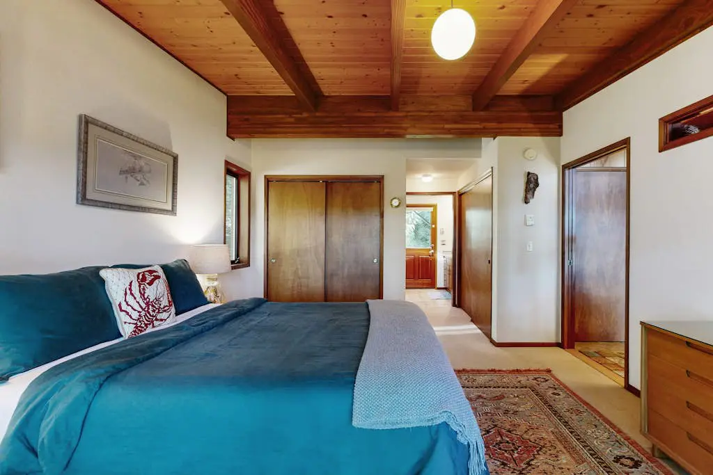 Unique lakefront cabin near the dunes with a private dock & fireplace