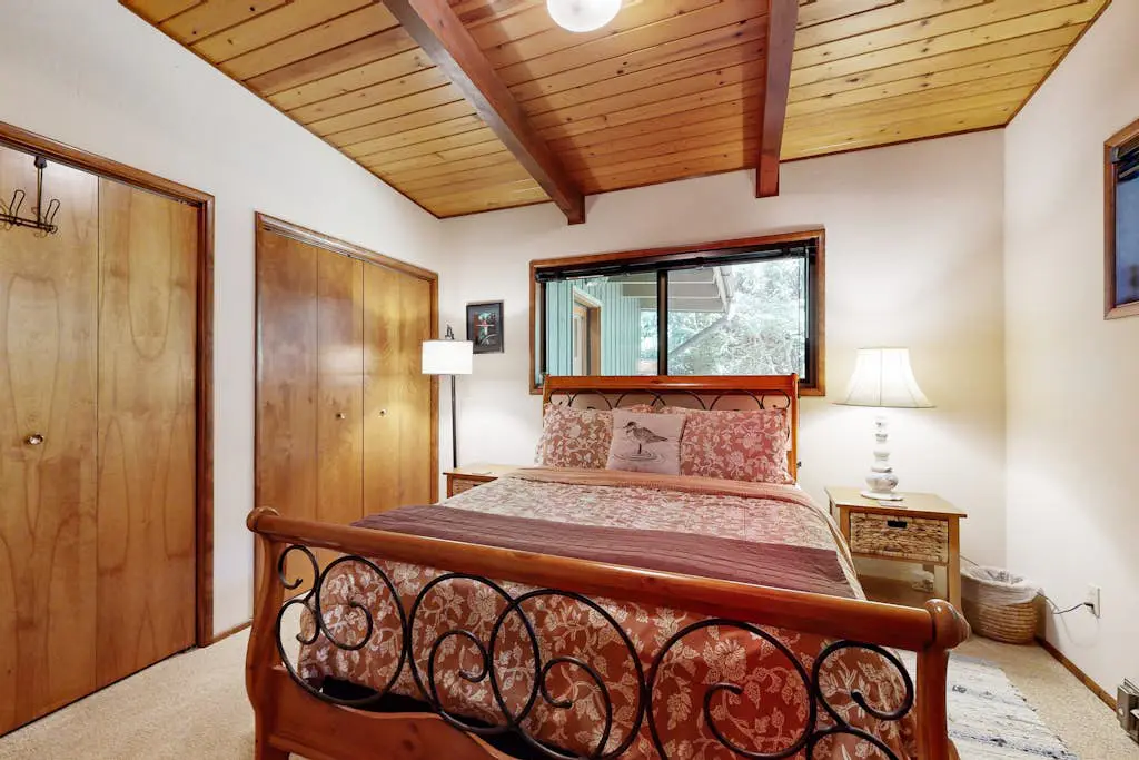 Unique lakefront cabin near the dunes with a private dock & fireplace