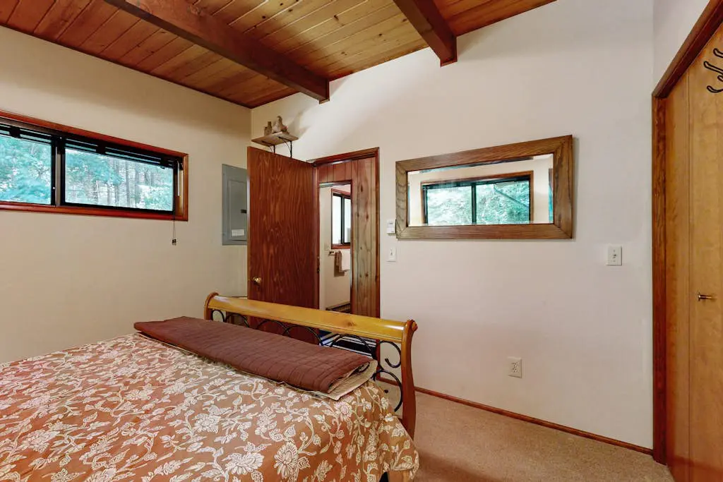 Unique lakefront cabin near the dunes with a private dock & fireplace