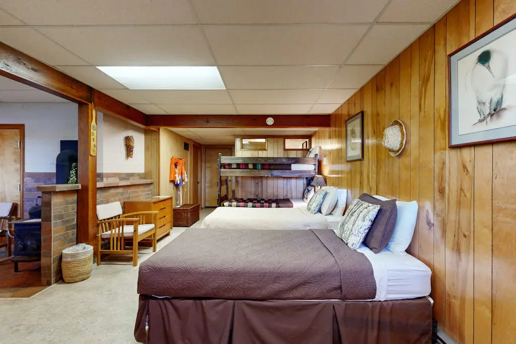 Unique lakefront cabin near the dunes with a private dock & fireplace