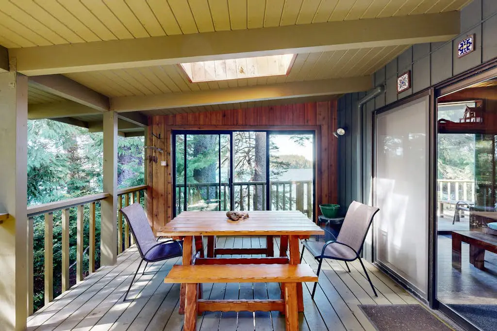 Unique lakefront cabin near the dunes with a private dock & fireplace