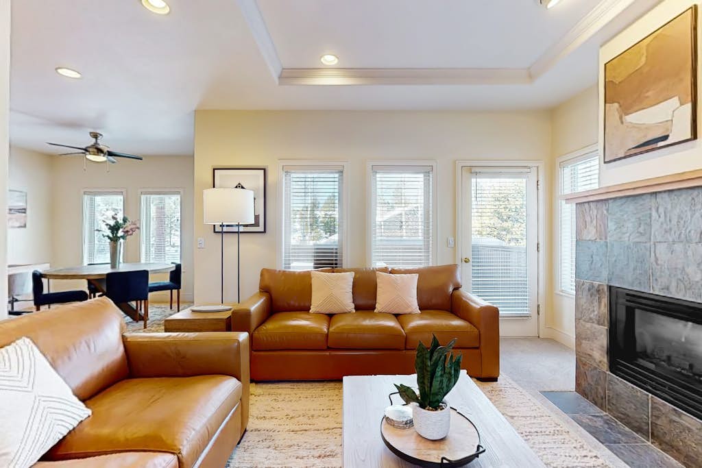 Conveniently located townhome with kitchen, kitchenette, balcony & fireplace