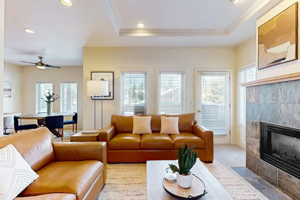 Conveniently located townhome with kitchen, kitchenette, balcony & fireplace