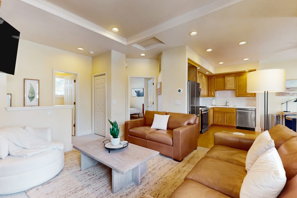 Conveniently located townhome with kitchen, kitchenette, balcony & fireplace