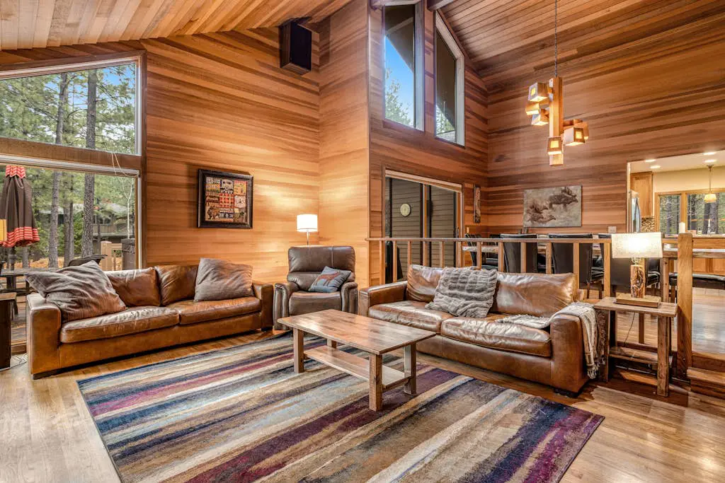 Forested getaway with kitchen, stone fireplace, pool, & private hot tub