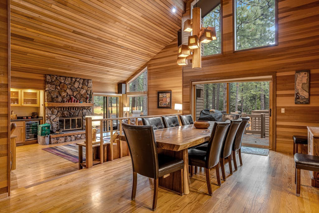 Forested getaway with kitchen, stone fireplace, pool, & private hot tub