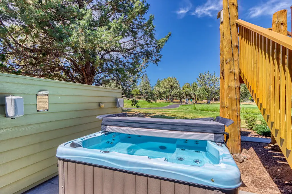Exquisite home with hot tub, golf on-site, pool, tennis, & washer&dryer