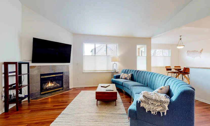 Dog-friendly home with enclosed yard, fireplace, W/D, central AC, & streaming