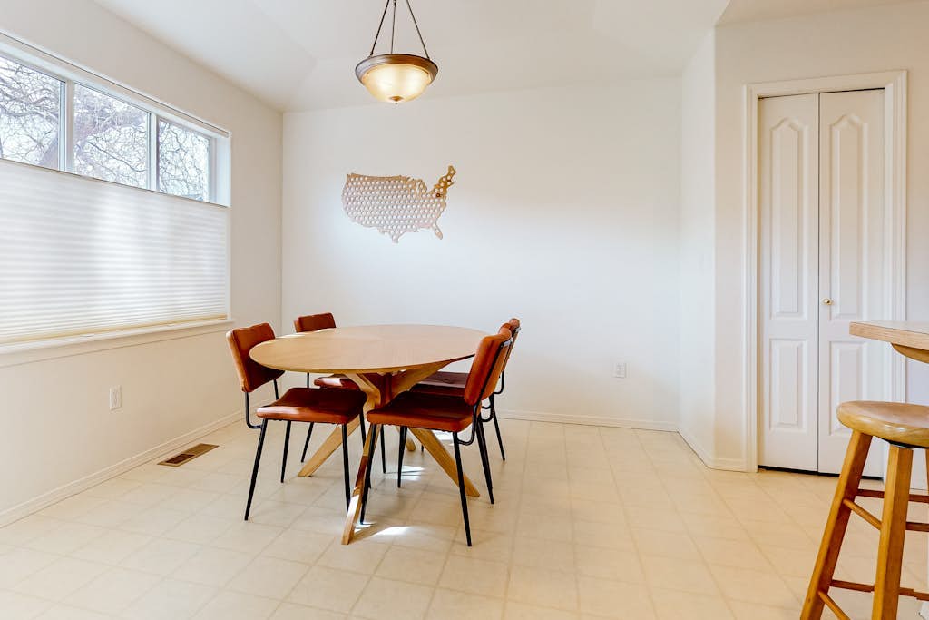 Dog-friendly home with enclosed yard, fireplace, W/D, central AC, & streaming