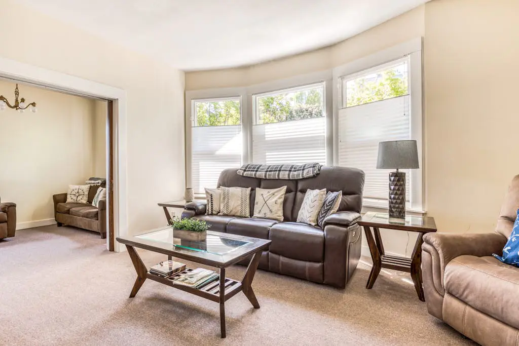 Spacious downtown craftsman with private hot tub, & river views