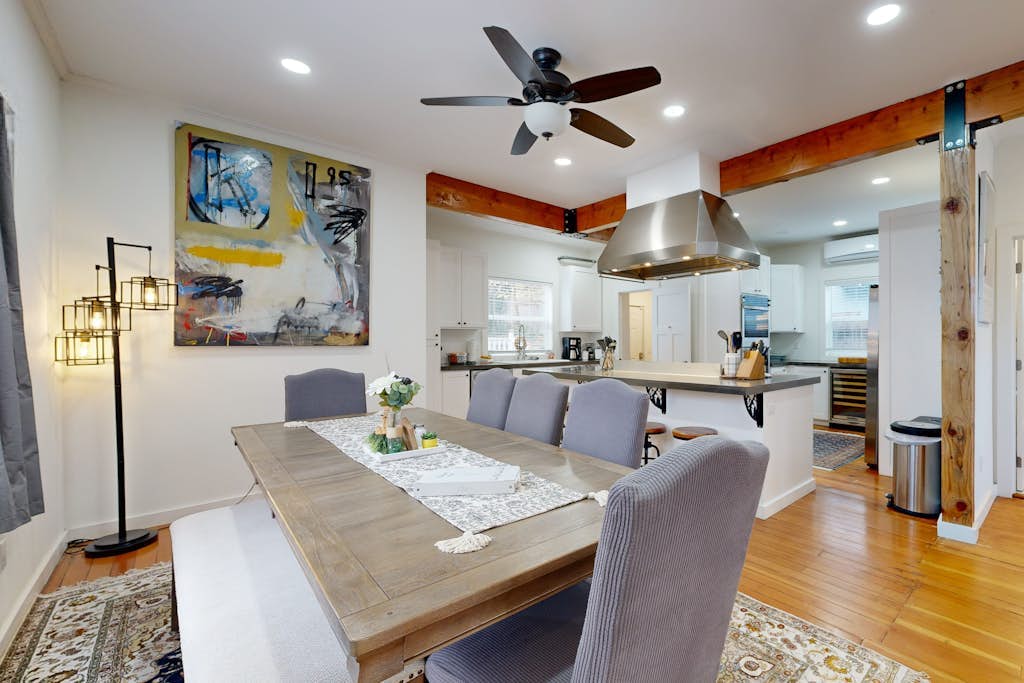 Relaxing river-view home with private patio, grill, covered balcony, & W&D