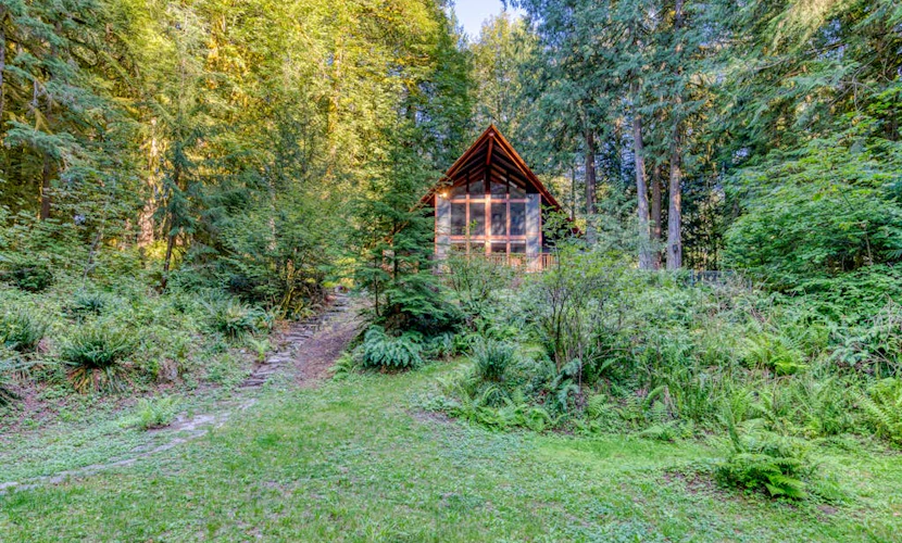 Creekside home with hot tub, deck, & great woodland views