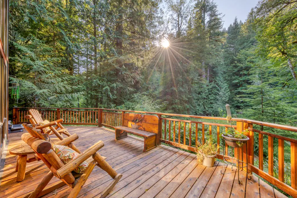 Creekside home with hot tub, deck, & great woodland views