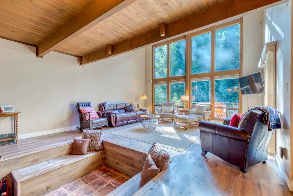 Creekside home with hot tub, deck, & great woodland views
