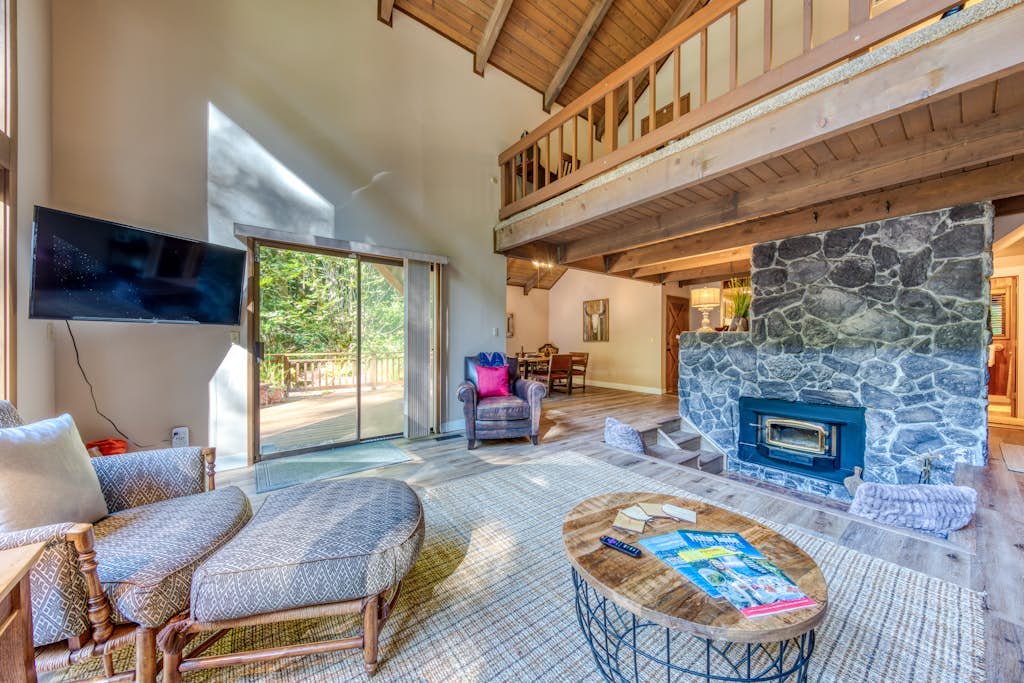 Creekside home with hot tub, deck, & great woodland views