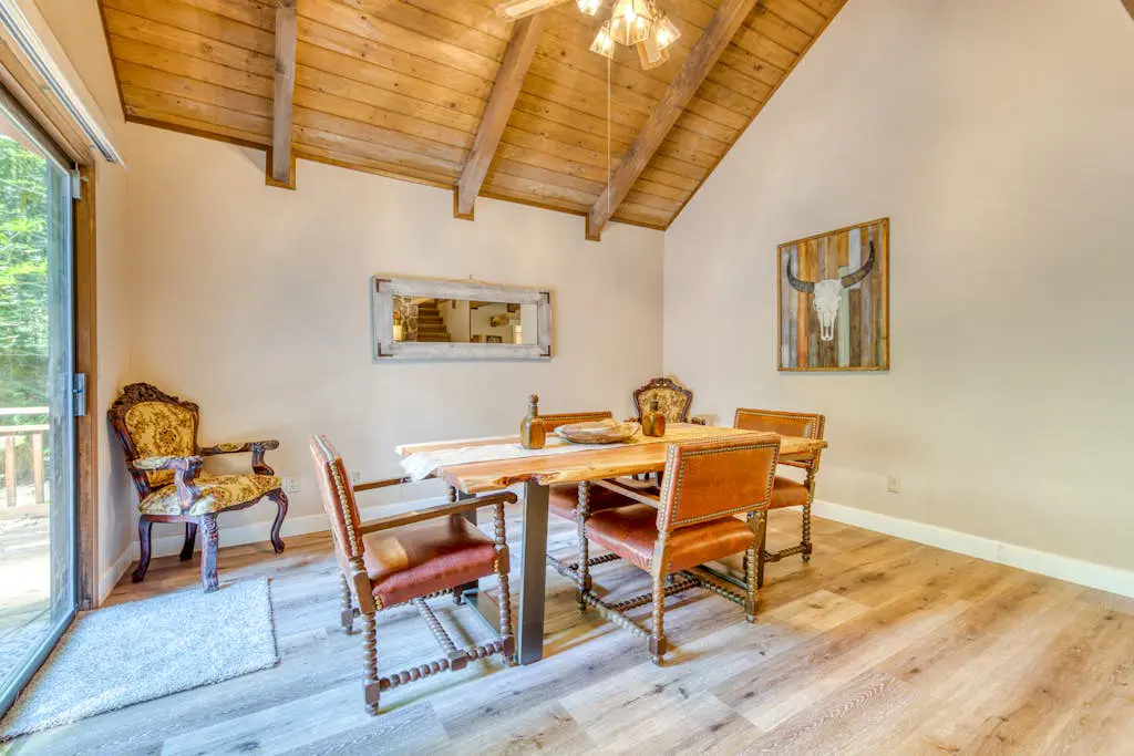 Creekside home with hot tub, deck, & great woodland views