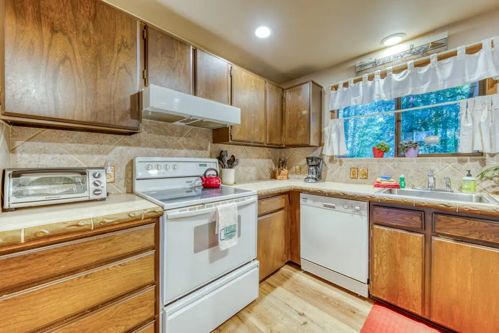 Creekside home with hot tub, deck, & great woodland views