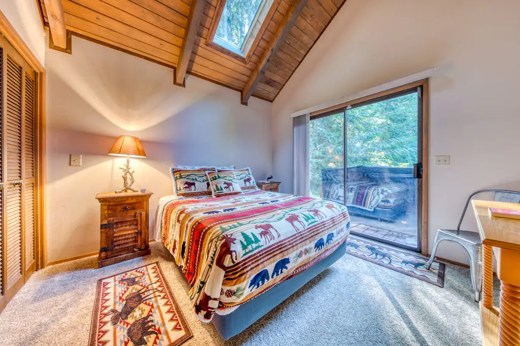 Creekside home with hot tub, deck, & great woodland views