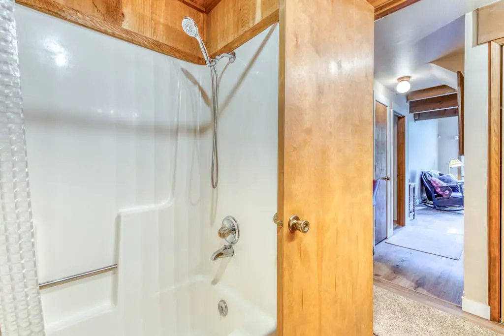 Creekside home with hot tub, deck, & great woodland views
