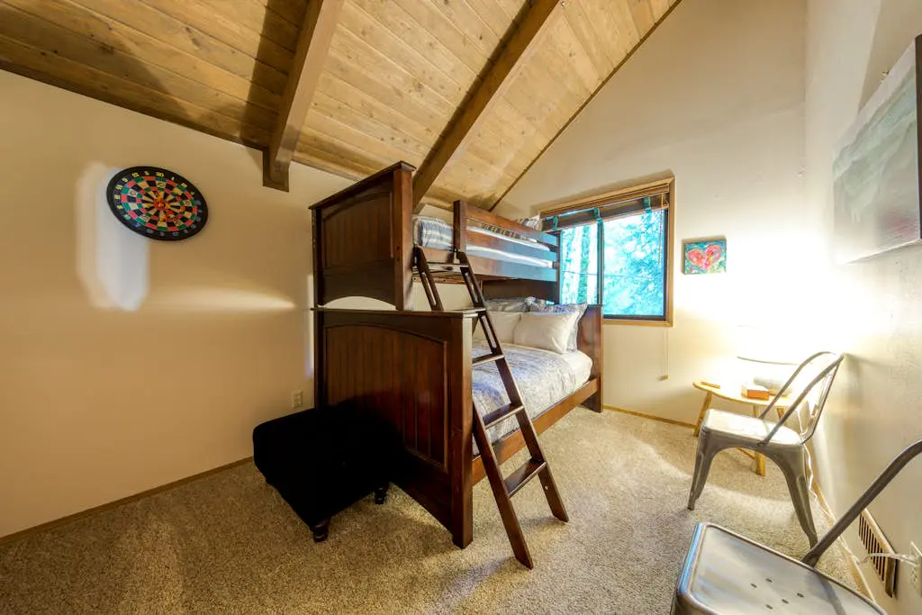 Creekside home with hot tub, deck, & great woodland views
