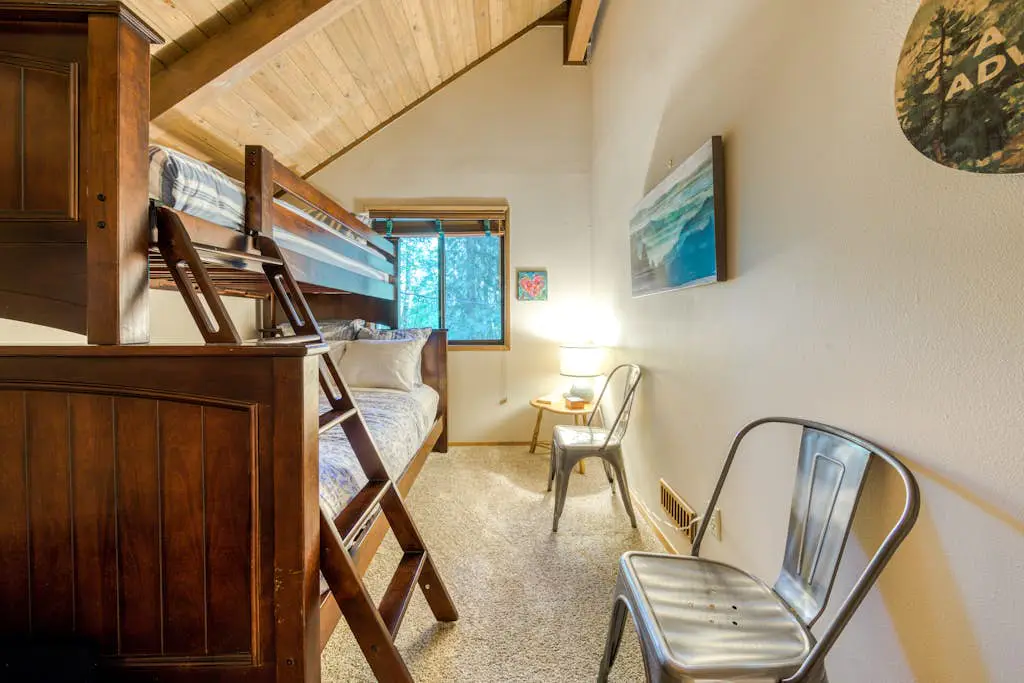 Creekside home with hot tub, deck, & great woodland views