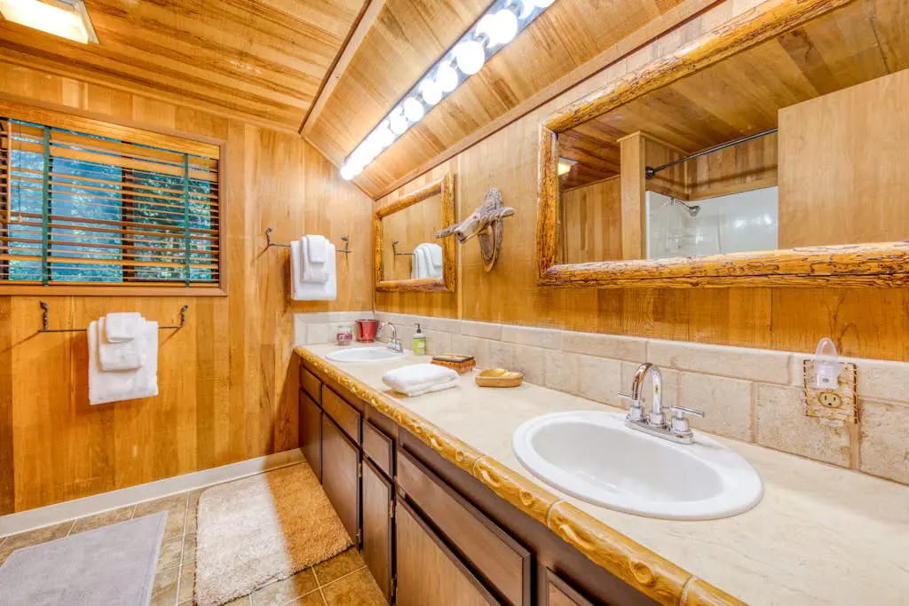 Creekside home with hot tub, deck, & great woodland views