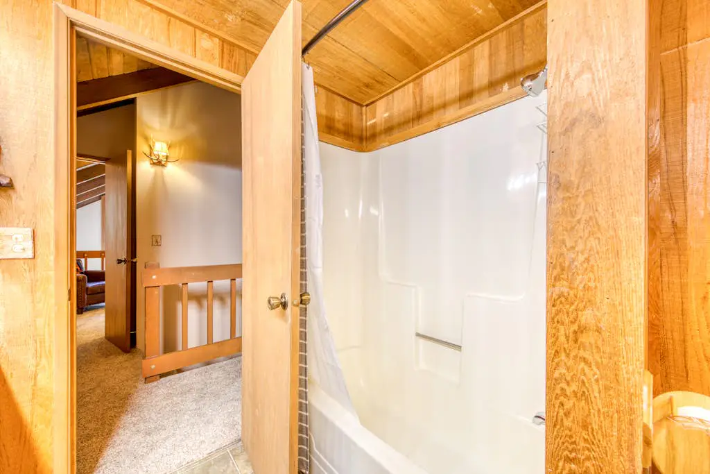 Creekside home with hot tub, deck, & great woodland views