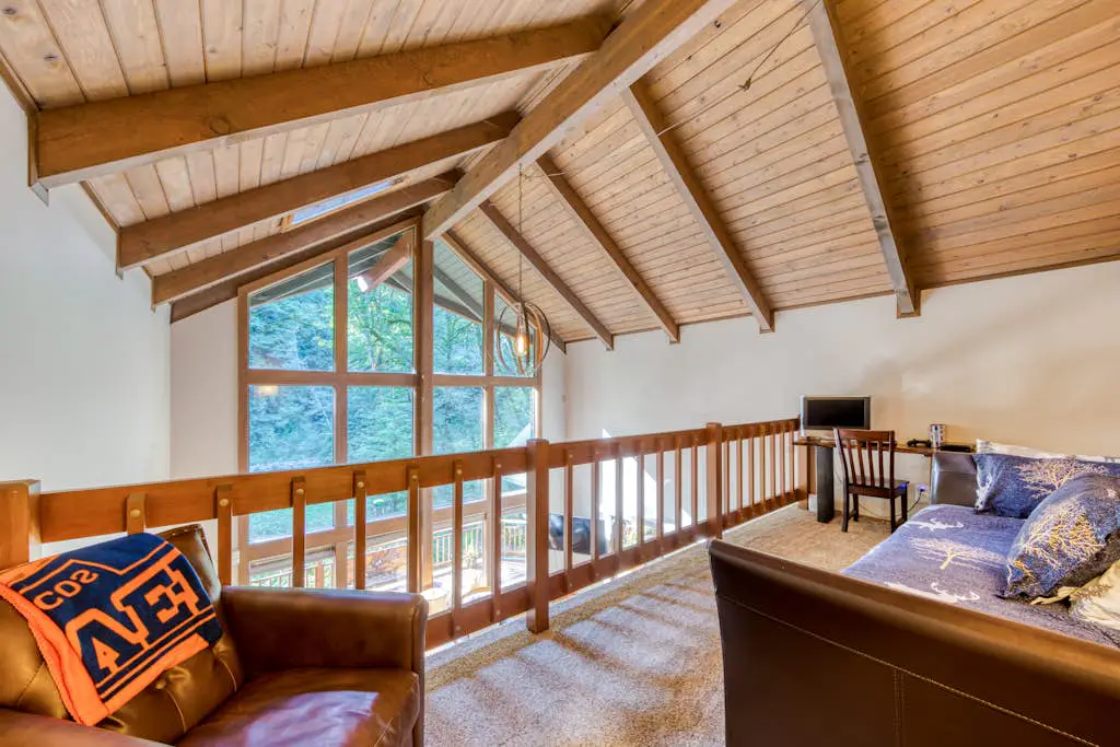 Creekside home with hot tub, deck, & great woodland views