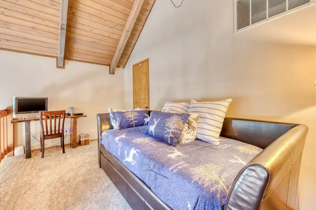 Creekside home with hot tub, deck, & great woodland views
