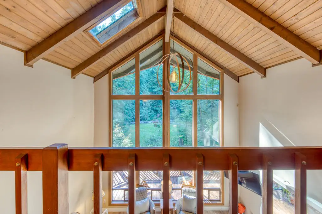 Creekside home with hot tub, deck, & great woodland views