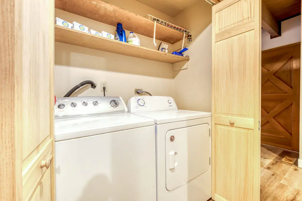 Creekside home with hot tub, deck, & great woodland views