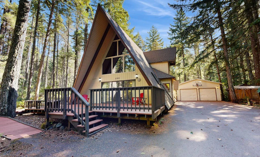 Dog-friendly, A-frame cabin with private hot tub - tranquil setting near skiing