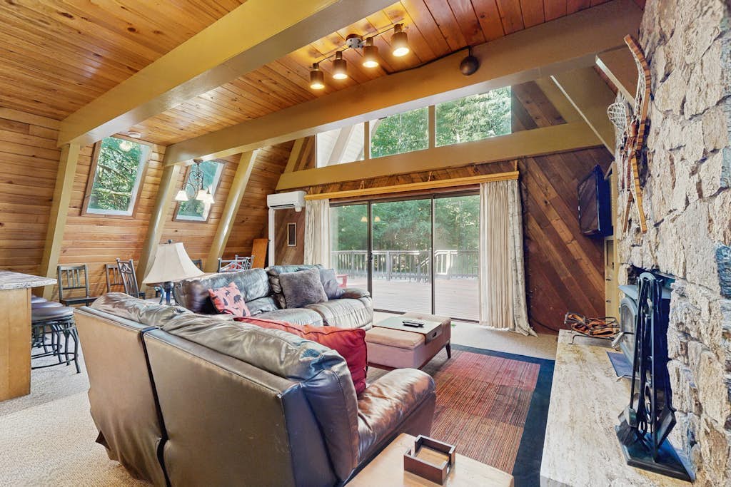 Dog-friendly, A-frame cabin with private hot tub - tranquil setting near skiing
