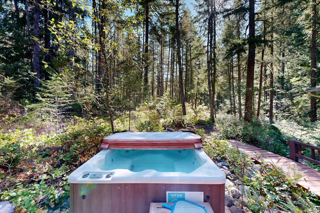 Dog-friendly, A-frame cabin with private hot tub - tranquil setting near skiing