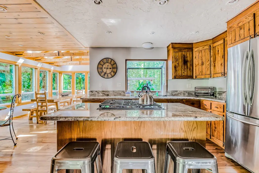 Dog-friendly creekside home with entertainment barn, private hot tub & firepit