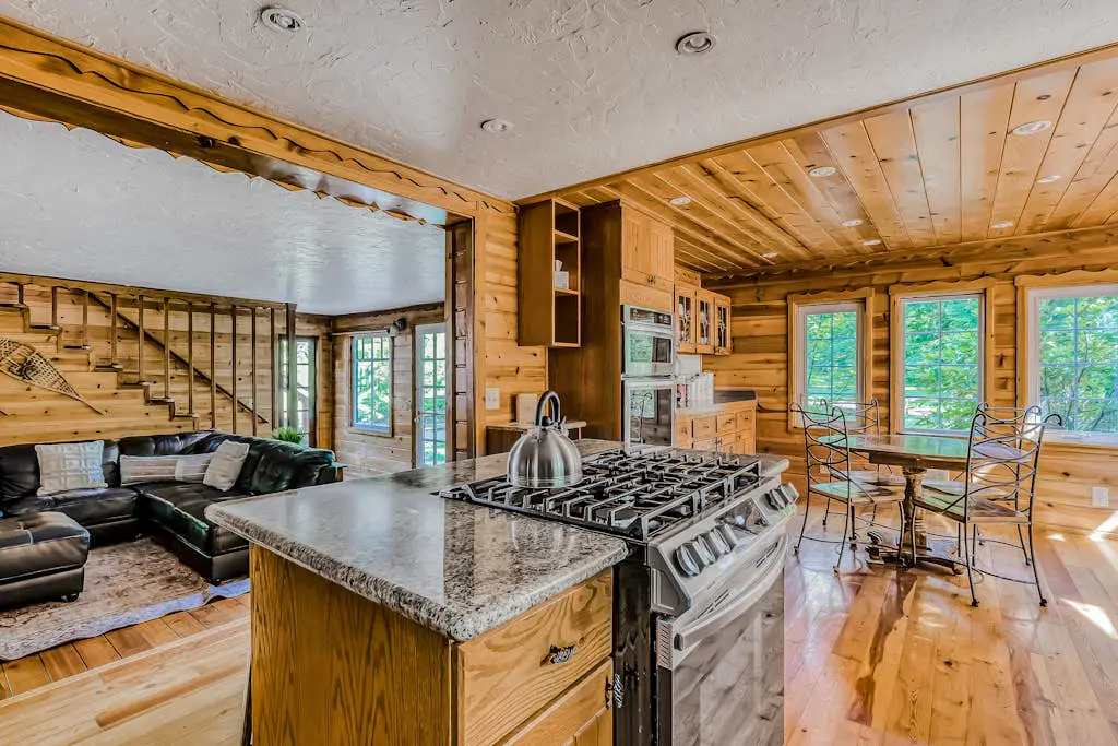 Dog-friendly creekside home with entertainment barn, private hot tub & firepit