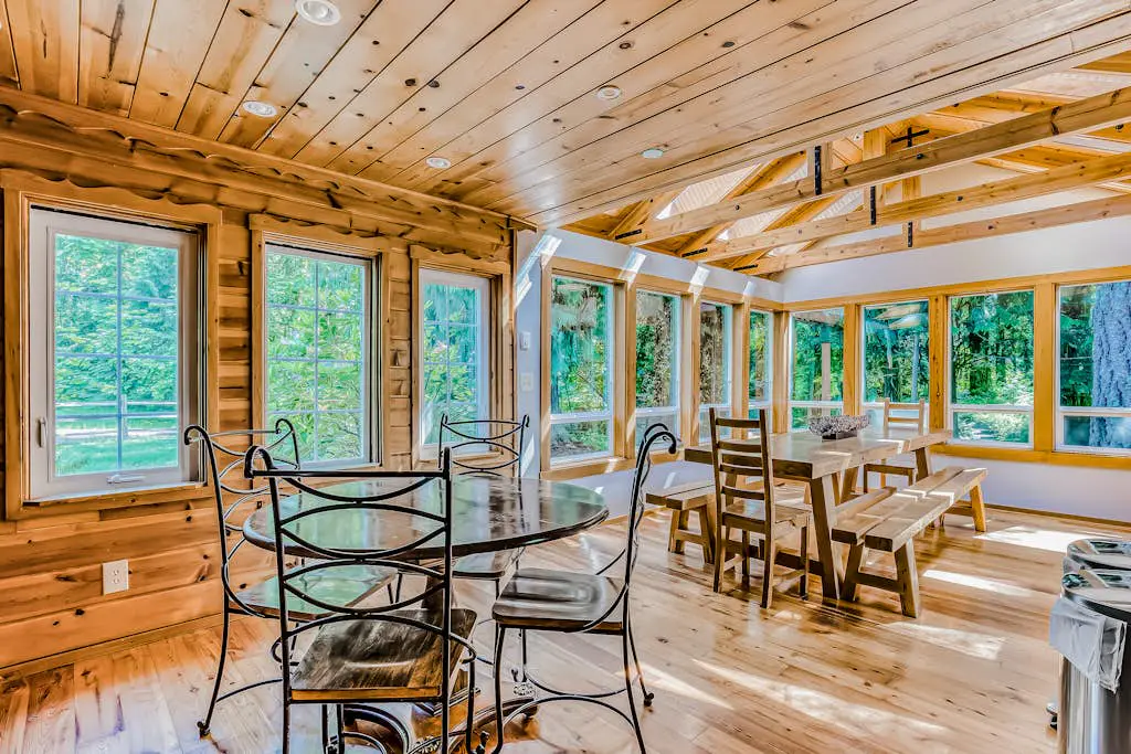 Dog-friendly creekside home with entertainment barn, private hot tub & firepit